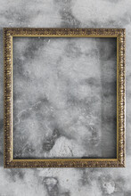 Gold Picture Frame On Concrete Background - Vertical