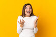 © luismolinero - Young Slovak woman isolated on yellow background with surprise facial expression