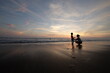 couple on the beach at sunset