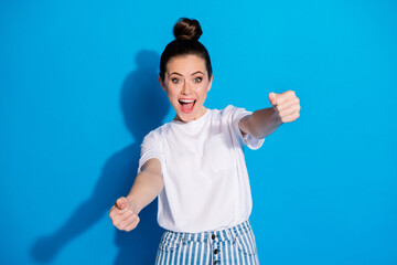 Sticker - Portrait of astonished positive girl hold hands imagine drive car steering wheel impressed fast speed scream wow omg wear striped denim jeans isolated over bright shine color background