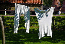 Old Fashioned Men's Underwear Hangs To Dry. On The Clothesline.