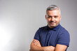 © Nenad - Hipster man in blue t-shirt, studio shot, isolated.
