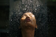 © Marko/Stocksy - Woman taking shower