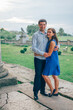 © romanlv - young couple standing together on a stone staircase