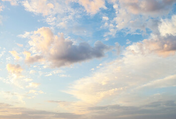 beautiful view of the morning white clouds in the blue sky. peach beige color clouds. homosphere. su