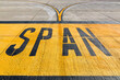 © MyMicrostock/Stocksy - SPAN Lettering in the airport runway