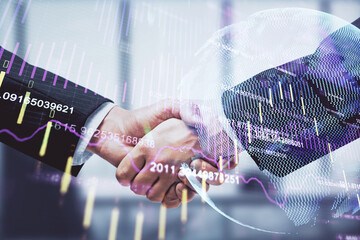 Double exposure of forex graph hologram and handshake of two men. Stock market concept.