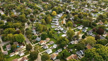 Aerial Drone View Of American Suburban Neighborhood. Establishing Shot Of America's  Suburb. Residential Single Family Houses Pattern. Autumn Fall Season