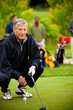 © Sean Locke Photography/Stocksy - Golf: Senior Golfer Ready to Drive Ball