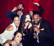© Sean Locke Photography/Stocksy - Portraits: Group Of Friends Having Fun In Photo Booth