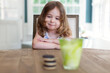 © Jakob Lagerstedt/Stocksy - Cute toddler eagerly awaiting cookies and milk