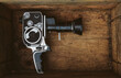 © kkgas/Stocksy - Vintage cinema camera inside an old grungy box.