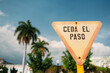 © Gabriel Tichy/Stocksy - Warning road sign in Cuba