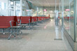 © BONNINSTUDIO/Stocksy - Empty departure lounge at the airport.