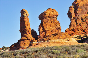 Wall Mural - Sculptures from a red stone.