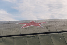 Wing Of An Old Soviet Airplane With Red Star Insignia
