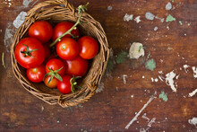 Garden Tomatoes On A Basket