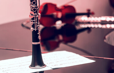 Sticker - Selective focus shot of flute with a violin background