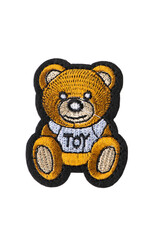 yellow teddy bear embroidered patch isolated on white background