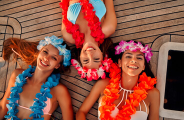 Wall Mural - Female friends on yacht