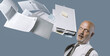 © stokkete - Paperwork hitting a businessman's head