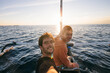 © AlejandroMCB photo & film/Stocksy - Two young friends taking a selfie while traveling on a traditional Asian boat on adventure travel
