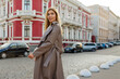 © Svetlana Sokolova - Autumn fashion trends. Blond woman in grey leather coat posing in the street.
