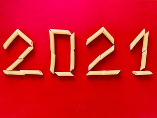 2021 numbers from pasta on red background