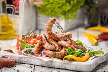 Wall Mural - Grilled sausages and vegetables