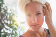 © Tetra Images - Portrait of happy blonde woman smiling