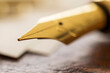 © Tetra Images - Close up of fountain pen
