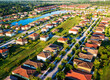 © Daniel Grill/Tetra Images - Aerial view of suburbs