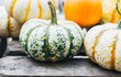 © Tetra Images - Pumpkins on table