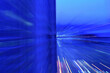 © DERMOT CONLAN/Tetra Images - Motion blurred lights at dusk, abstract blue image