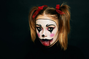 Close up portrait of young teenage girl with Halloween makeup