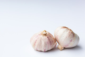 two head of garlic isolated on white background