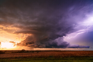Wall Mural - stormy sky with dramatic clouds at sunset