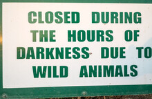 Sign With The Text Closed During The Hours Of Darkness Due To Wild Animals In South Africa Concept Safari In Africa