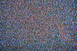© Tom Eells Photo/Stocksy - Static and noise on an old TV screen