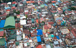 © Lawrence del Mundo/Stocksy - Aerial view of residential portion of a city