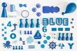 © Mellimage/Stocksy - Collection of blue toys and game pieces