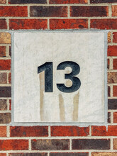 Number 13 on a street wall