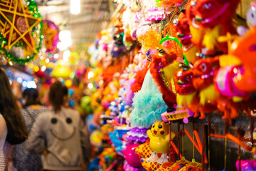 Wall Mural - Decorated colorful lanterns hanging on a stand in the streets of Cholon in Ho Chi Minh City (Saigon), Vietnam during Mid Autumn Festival of Lunar Calendar.