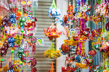 Decorated colorful lanterns hanging on a stand in the streets of Cholon in Ho Chi Minh City (Saigon), Vietnam during Mid Autumn Festival of Lunar Calendar.