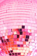 © Sonja Lekovic/Stocksy - pink shiny disco ball party background