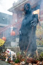 Scary Grim Reaper And Skeleton Dog Halloween Decorations On House Walkway