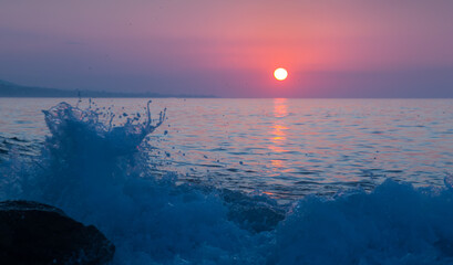 Dawn view of Mediterranean and splashes