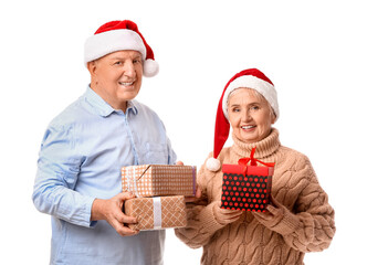 Poster - Elderly couple with Christmas gifts on white background