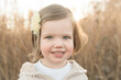 © Alison Winterroth Photography/Stocksy - Young Girl Looks At The Camera