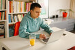 © Marija Kovac/Stocksy - Man working at his beautiful home office, horizontal